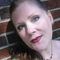 Professional headshot of Jane U, IT Support Group community member